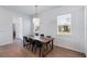 Bright dining room featuring a table with chairs and lots of natural light at 779 Firerock Ln, Debary, FL 32713