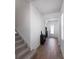 Elegant foyer featuring wood-look tile flooring, stairs and lots of natural light at 779 Firerock Ln, Debary, FL 32713