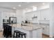 Modern kitchen featuring granite countertops, stainless steel appliances, and white cabinetry at 779 Firerock Ln, Debary, FL 32713