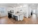 Modern kitchen featuring granite countertops, stainless steel appliances, and white cabinetry at 779 Firerock Ln, Debary, FL 32713