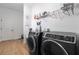 Modern laundry room equipped with washer and dryer at 779 Firerock Ln, Debary, FL 32713