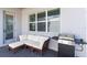 Outdoor patio features a grill and seating area, perfect for relaxation and entertainment at 779 Firerock Ln, Debary, FL 32713