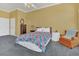 Inviting bedroom with large window, plush bedding and a cozy reading nook at 8061 Bangle Ln, Orlando, FL 32836
