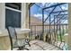Cozy balcony with wrought iron railing offers a relaxing outdoor space with neighborhood views at 9018 Southern Breeze Dr, Orlando, FL 32836