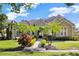 Beautiful single-Gathering home with well manicured landscaping, brick walkway, and tile roof at 9018 Southern Breeze Dr, Orlando, FL 32836