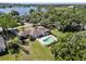 Aerial view of a single-Gathering house with a screen porch and swimming pool at 29 Windsor Isle Dr, Longwood, FL 32779