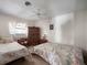 Bedroom featuring two twin beds, ceiling fan, and ample space at 29 Windsor Isle Dr, Longwood, FL 32779