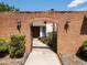 An arched brick wall invites you to the home's front door at 29 Windsor Isle Dr, Longwood, FL 32779
