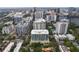 Scenic aerial view of the city showcasing modern high-rise buildings and lush greenery at 101 S Eola Dr # 1018, Orlando, FL 32801
