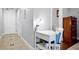 Cozy bedroom with a functional workspace setup and neutral decor at 101 S Eola Dr # 1018, Orlando, FL 32801