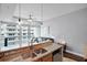 Modern kitchen features granite countertops, stainless steel appliances, and a breakfast bar with views at 101 S Eola Dr # 1018, Orlando, FL 32801