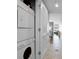 Convenient condo laundry closet with stacked washer and dryer at 101 S Eola Dr # 1018, Orlando, FL 32801