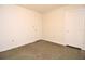Spare bedroom with a linoleum floor, white walls, and two doors at 1125 N Mc Donald St, Mount Dora, FL 32757