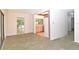 An interior view of a living room and kitchen at 1125 N Mc Donald St, Mount Dora, FL 32757