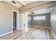 Spacious bedroom features modern ceiling fan, large closet, and neutral wall color at 1234 Parker Ave, Deltona, FL 32725
