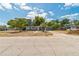 Exterior shot of a single-story home featuring a well-kept front lawn and driveway at 1234 Parker Ave, Deltona, FL 32725