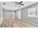 Living room boasting updated flooring, neutral paint, and plenty of natural light at 1234 Parker Ave, Deltona, FL 32725