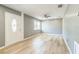Spacious living room showcases hardwood flooring, abundant natural light, and inviting entryway at 1234 Parker Ave, Deltona, FL 32725