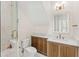 Modern bathroom features a glass shower, beautiful vanity, and stylish fixtures at 1341 Lyndale Blvd, Winter Park, FL 32789
