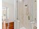 This bathroom features a shower with beige textured tile, bench, and a bronze shower head and handle at 1341 Lyndale Blvd, Winter Park, FL 32789
