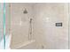 Walk-in shower with tiled walls and a showerhead with digital controls at 1341 Lyndale Blvd, Winter Park, FL 32789