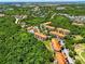 Aerial view of a community surrounded by lush greenery and resort-style amenities at 1375 Tuscana Ln # 1408, Davenport, FL 33896