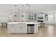 Open living space features a kitchen island, dining area and living room at 14838 Bahama Swallow Blvd, Winter Garden, FL 34787