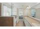 Open bathroom with double sinks, granite countertops, a soaking tub, and a glass enclosed shower at 14838 Bahama Swallow Blvd, Winter Garden, FL 34787