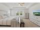 Well-lit main bedroom with plush carpeting, and modern decor at 14838 Bahama Swallow Blvd, Winter Garden, FL 34787