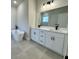 Beautiful bathroom boasting double sinks, a soaking tub, and a large mirror reflecting a walk-in shower at 15750 Sw 40Th Ter Sw 40Th Ter, Ocala, FL 34473