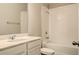 Bright bathroom with a shower-tub combo and white vanity at 16271 Silver Grove Blvd, Winter Garden, FL 34787