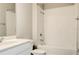 Bright white bathroom with tub and a shower at 16271 Silver Grove Blvd, Winter Garden, FL 34787