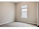 Neutral bedroom with light-colored carpet and a window with blinds at 16271 Silver Grove Blvd, Winter Garden, FL 34787