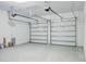 Spacious two-car garage with automatic doors and bright lighting at 16271 Silver Grove Blvd, Winter Garden, FL 34787