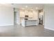 Open-concept kitchen featuring stainless steel appliances and a large island, perfect for entertaining at 16271 Silver Grove Blvd, Winter Garden, FL 34787
