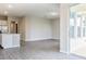 Open-concept living space features wood-look floors, neutral paint and lots of natural light at 16271 Silver Grove Blvd, Winter Garden, FL 34787