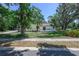 A beautiful single-story home with well-maintained landscaping and a spacious yard at 1635 Magnolia Ave, South Daytona, FL 32119