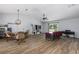 Cozy living room featuring hardwood floors and plenty of space for both living and dining at 1635 Magnolia Ave, South Daytona, FL 32119