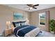 Beautifully staged bedroom with serene decor and abundant natural light at 16771 Sw 21St Terrace Rd, Ocala, FL 34473