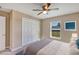 Virtually staged bedroom with carpet, ceiling fan, closet and a window at 16771 Sw 21St Terrace Rd, Ocala, FL 34473