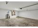 Unfinished garage with concrete floor and utility closet at 16771 Sw 21St Terrace Rd, Ocala, FL 34473