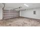The garage has an electrical outlet and a large gray garage door at 16771 Sw 21St Terrace Rd, Ocala, FL 34473