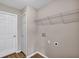 Small laundry room with washer/dryer hookups, a wire shelf, and neutral paint at 16771 Sw 21St Terrace Rd, Ocala, FL 34473