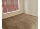 Cozy bedroom with neutral carpet and natural light from the window at 1805 San Luis Ln, The Villages, FL 32159