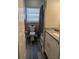 Bathroom featuring a shower/tub with grey tiling and white vanity at 2013 Sarazen Ct, Orlando, FL 32808