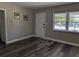 Bright living room with modern flooring, fresh paint, and a welcoming entryway for guests at 2013 Sarazen Ct, Orlando, FL 32808