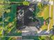 Overhead shot of the house showcasing the roof, driveway, and meticulous landscaping at 216 Shady Oaks Cir, Lake Mary, FL 32746