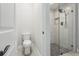 This bathroom features a modern glass shower and sleek fixtures at 216 Shady Oaks Cir, Lake Mary, FL 32746