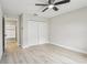 This bedroom includes hardwood floors and an attached closet at 216 Shady Oaks Cir, Lake Mary, FL 32746