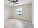 Bedroom with hardwood floors and a ceiling fan at 216 Shady Oaks Cir, Lake Mary, FL 32746